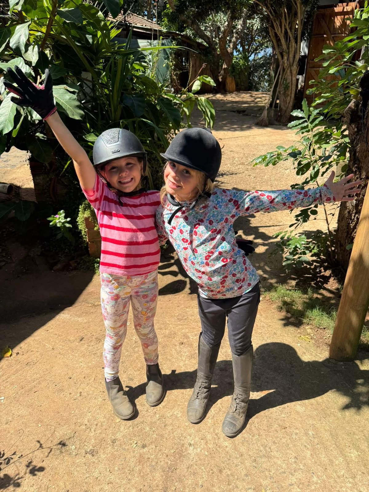 Two children cheering after their ride